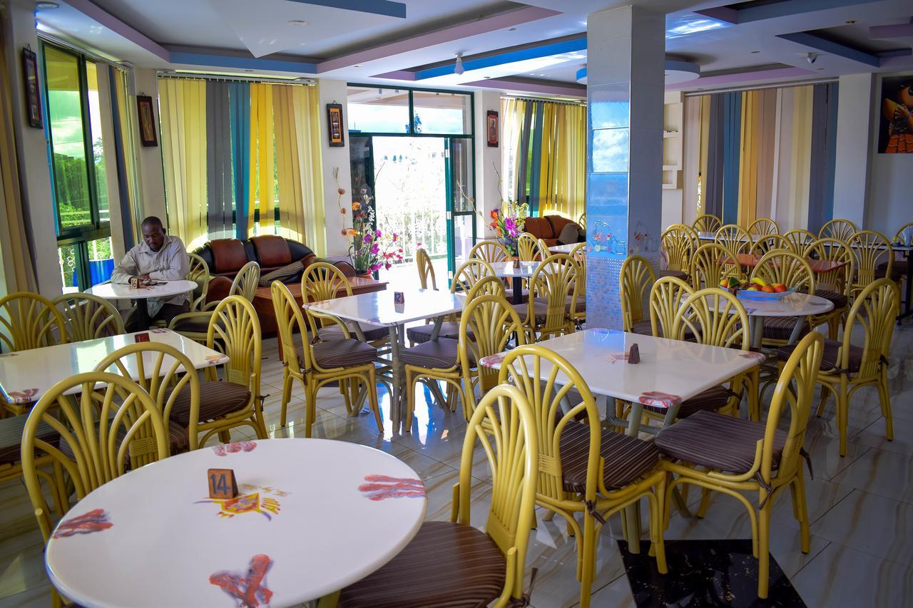 The Joy Hotel Voi Buitenkant foto